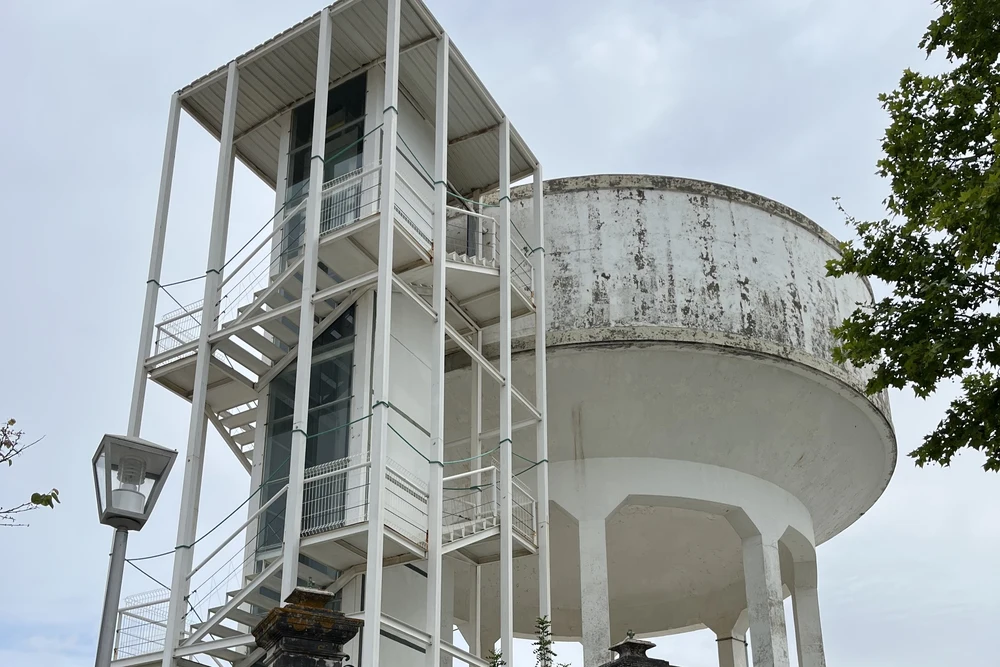 The distinctive white water tower structure of the Camera Obscura Tavira Eye, offering 360-degree views of the city.