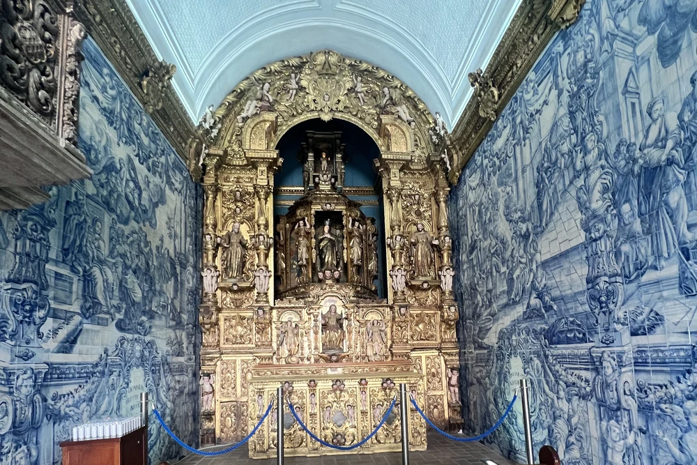 The stunning baroque altarpiece and walls covered in traditional Azulejo tiles inside the Ermida de Nossa Senhora da Conceição in Loulé.