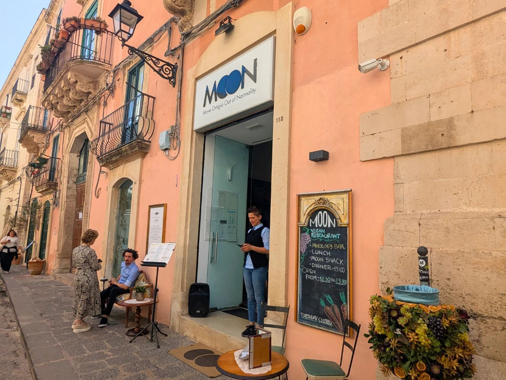 Exterior of MOON vegan restaurant on Via Roma in Ortigia, Sicily