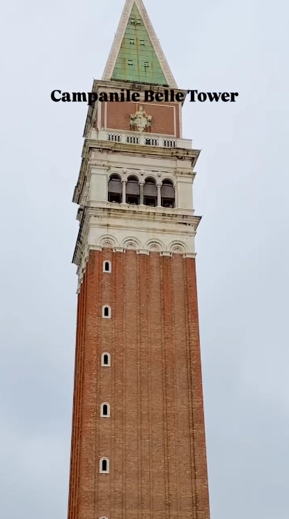 A close-up view of St. Mark's Bell Tower, the Campanile di San Marco, a top spot for panoramic views of Venice.