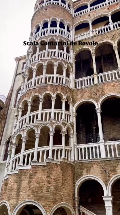The unique external spiral staircase of the Scala Contarini del Bovolo, a beautiful and historic architectural viewpoint in Venice.